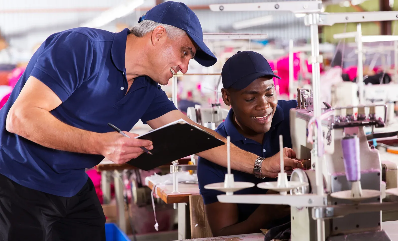 two men inside the production factory